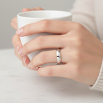 Model wearing white gold wedding band