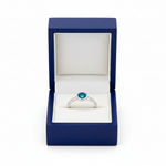 14k white gold ocean blue solitaire diamond ring with 0.50 ct tw, placed in a royal blue wooden box.