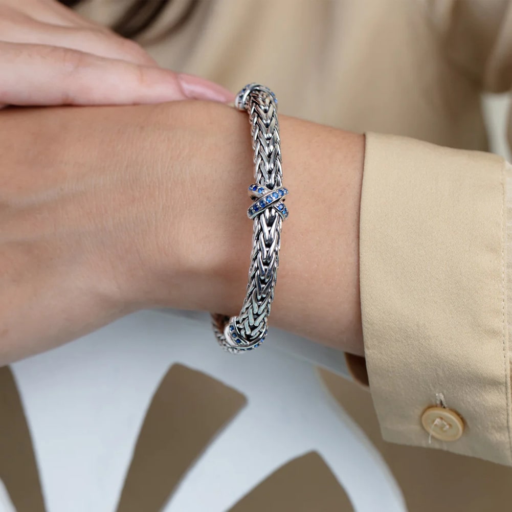 Sterling Silver Woven X Blue Sapphire Bracelet On Woman Hand (0.84 ct. tw)