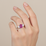 14k gold diamond pink sapphire fashion ring on hand, showcasing sparkling pink sapphire and diamond accents.
