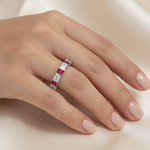 14k gold princess diamond and ruby eternity wedding band with 1.12 carats total weight, shown on a hand.