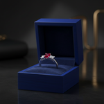 14k gold three-stone ruby and diamond fashion ring with princess-cut rubies, displayed in a gift box.