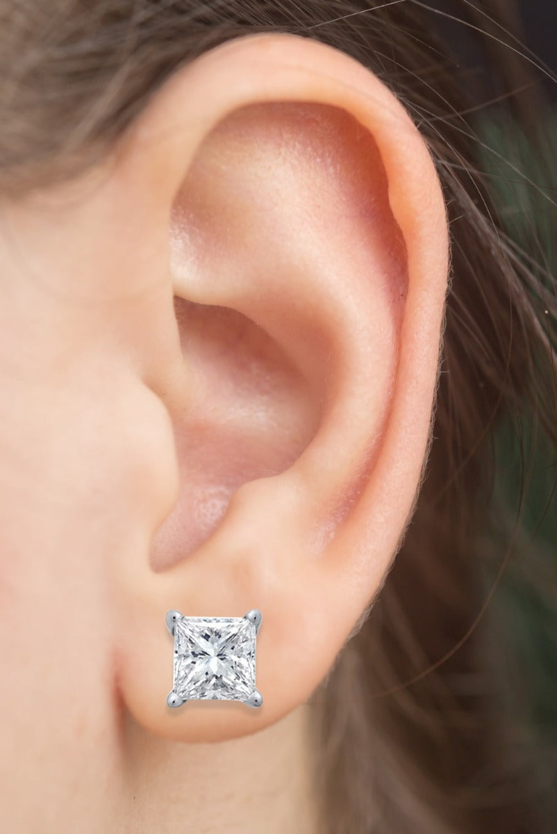 14K Gold Princess Cut Prong Diamond Earring Stud On Woman Ear (0.50.ct.tw)