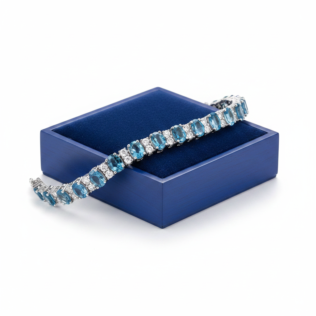 Swiss blue topaz bracelet on royal blue wooden box