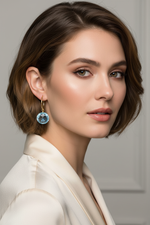 Swiss Blue Topaz Hoop Earrings on Model