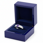 14k gold fashion ring featuring a rectangular Tanzanite and diamond accents in a royal blue gift box.