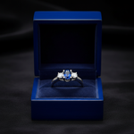 14k gold three-stone sapphire and diamond fashion ring with 1.40 carats total weight, displayed in a gift box.