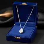 14k white gold lab-created diamond pendant necklace with 1.0 carat total weight in a royal blue box.