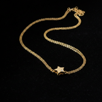 Yellow Gold Star Necklace - Flat Lay