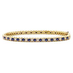 14k Gold Diamond Sapphire Tennis Bracelet (3.86.cts.tw)