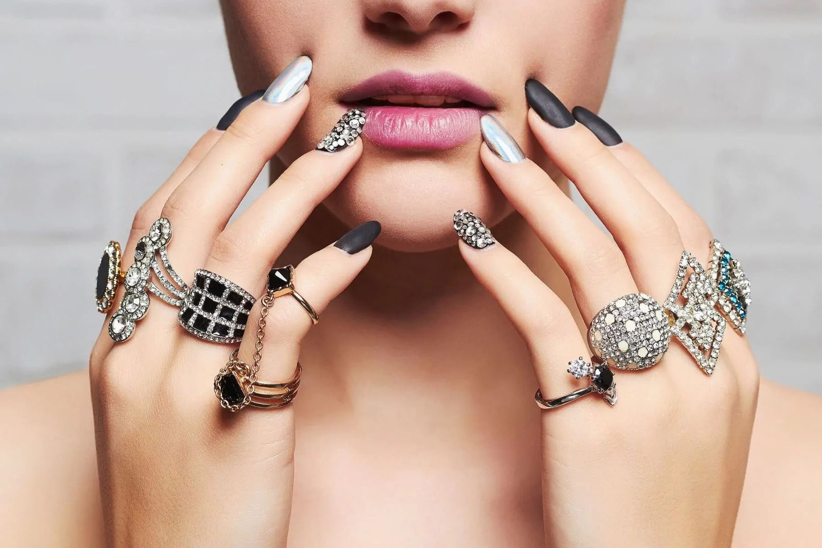 Assorted Diamond Gemstone Rings On Woman Hand